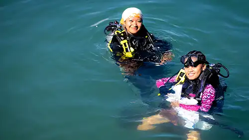 Diving First family clean the ocean